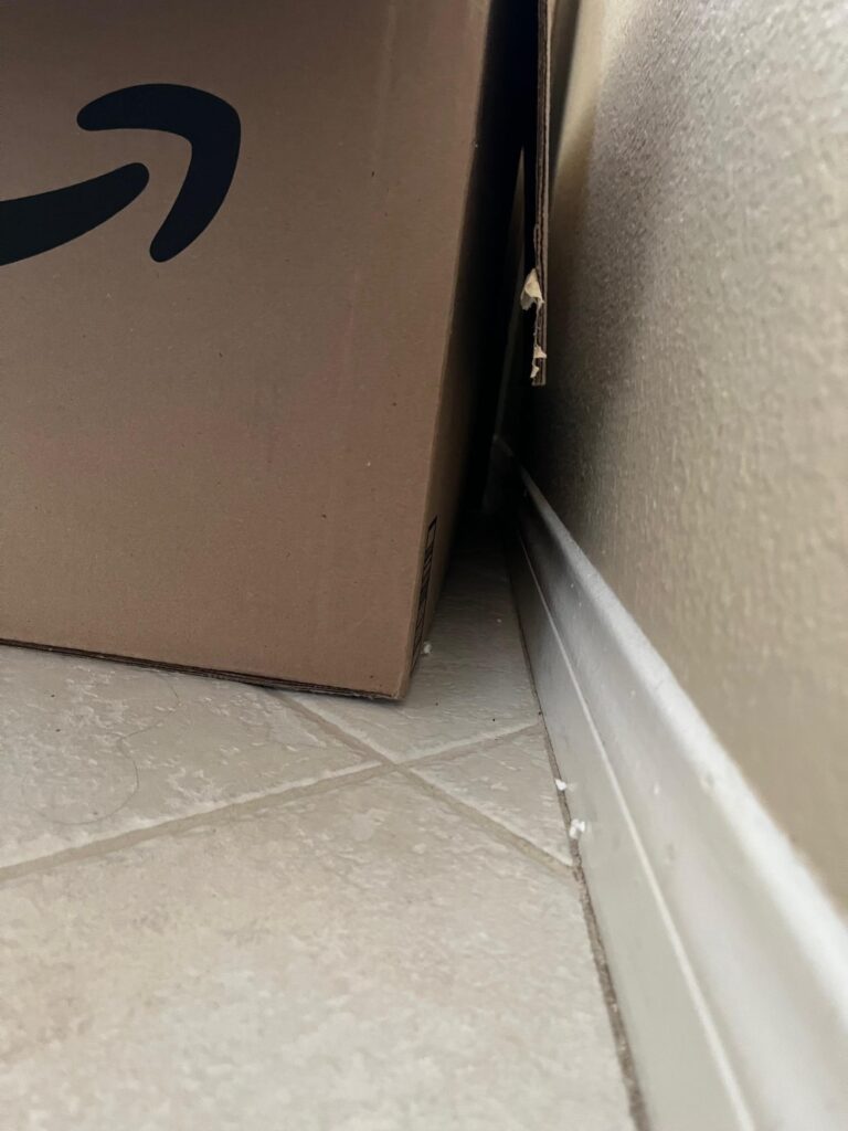 crack in between box and wall